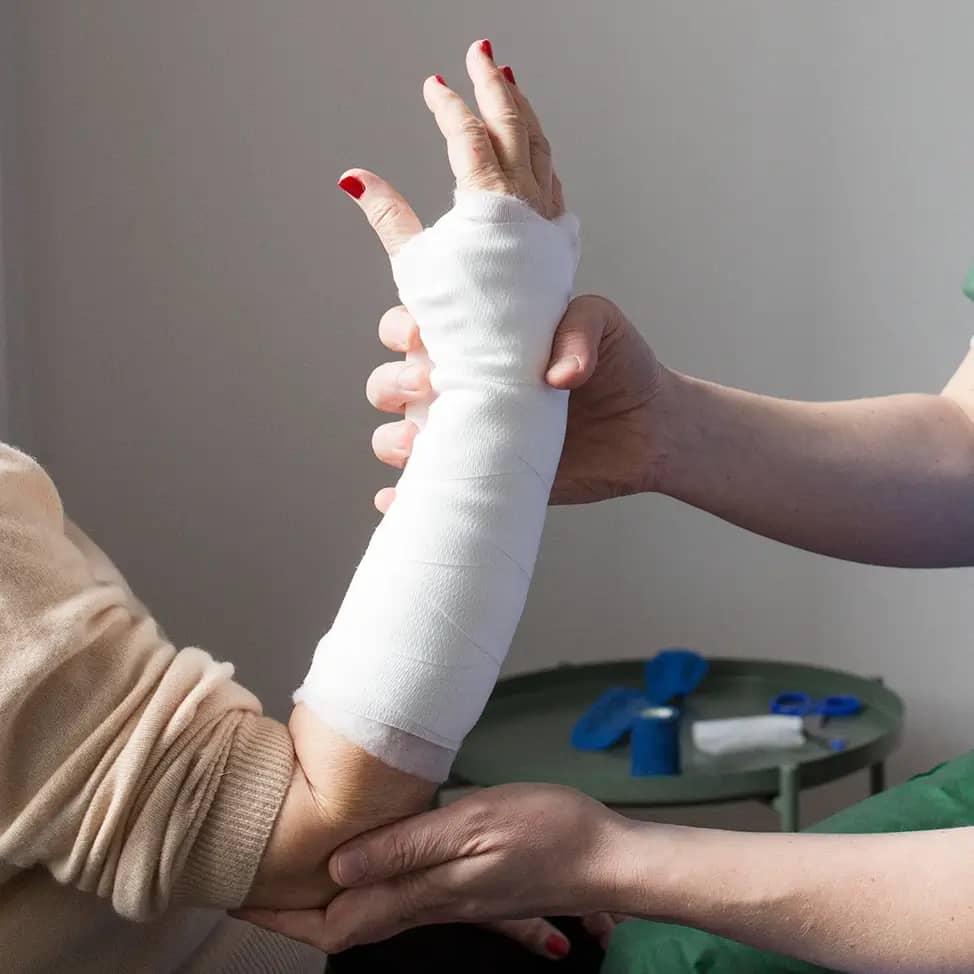Orthopedist examining a patient's forearm